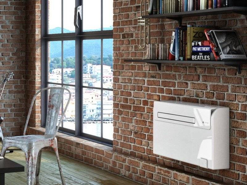 Agencement d'une climatisation réversible mono - bloc olympia unico 3,00kW sans groupe extérieur dans une maison de village à Salon de Provence